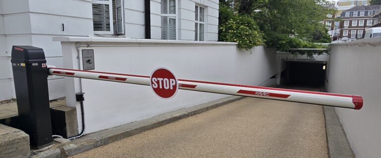 Barrier blocking access to residential garages