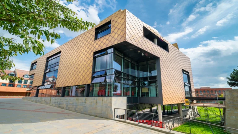 Modern education building, with a garden in the background