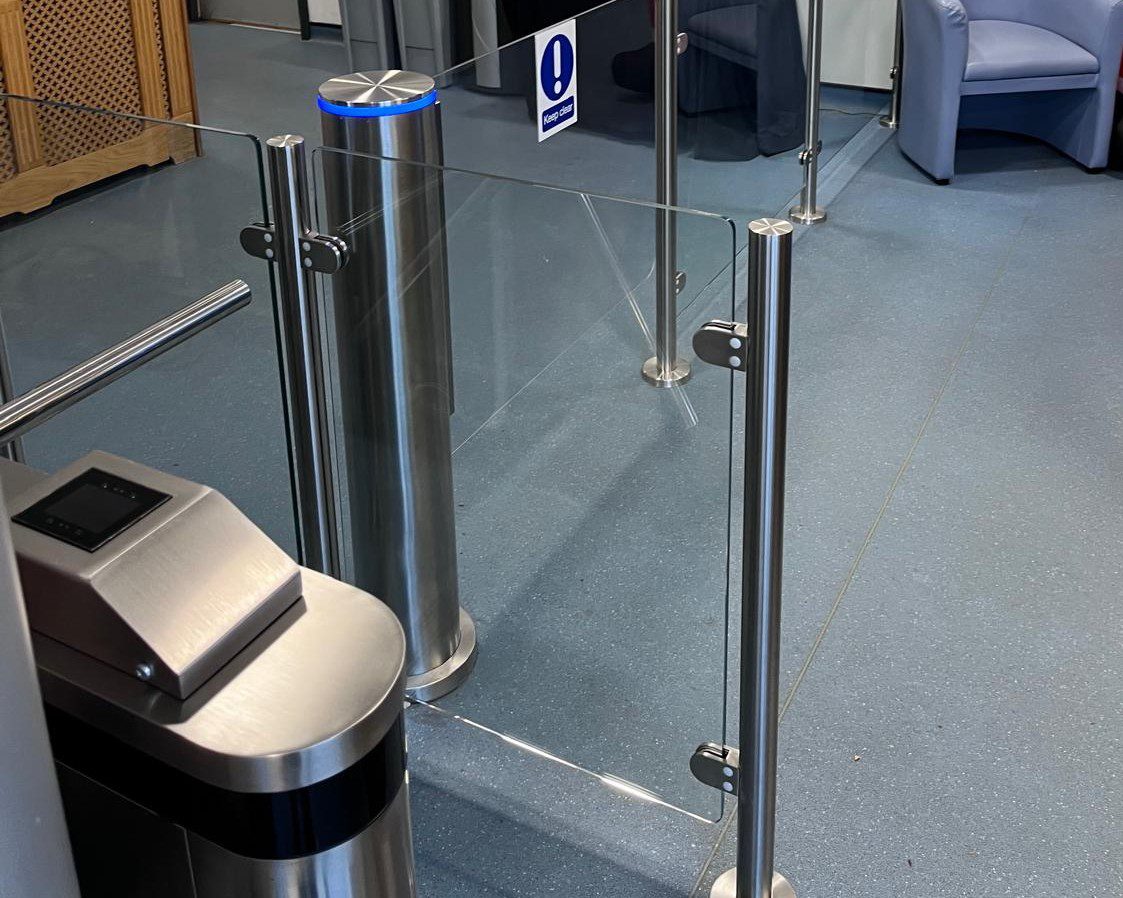 Flow turnstile and glass swing gate at the reception of a council operated leisure centre